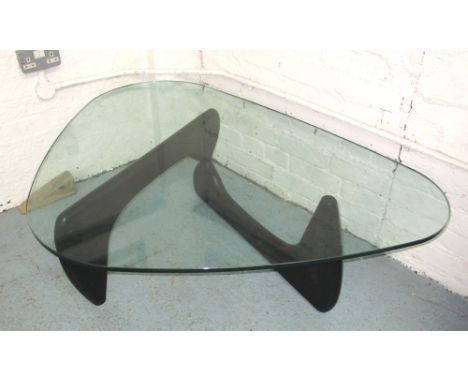 OCCASIONAL TABLE, Modernist style with thick glass top on ebonised base, 117cm x 105cm x 50cm H.