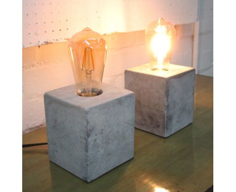 INDUSTRIAL DESIGN TABLE LAMPS, a pair, of cube cement form with filament pear shaped bulbs, 25cm H x 11cm W. (2)