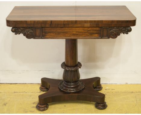 CARD TABLE, William IV rosewood, with green baize lined foldover top, leaf carved frieze and pedestal, 75cm H x 91cm W x 44cm