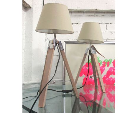 NAUTICAL DESIGN TABLE LAMPS, a pair, wood and metal tripod base with tapered white drum shades, 47cm H x 13cm W. (2)