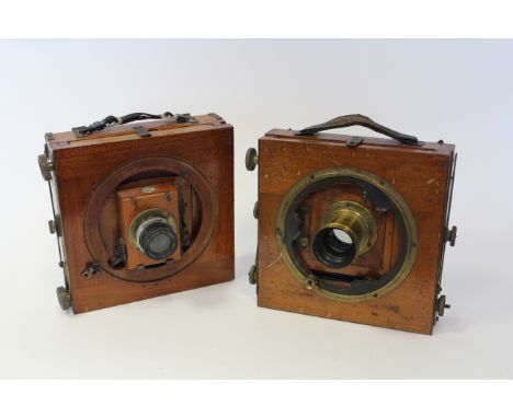 Half Plate Folding Camera, marked H Cousen & Co Bradford with lens, another mahogany and brass camera (2)