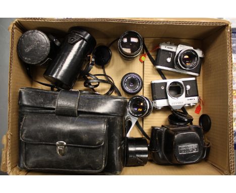 A Canon Pellix SLR Camera, with various lenses including FLP f/2.8 38mm, and more, also with a second Pellix body (a lot)
