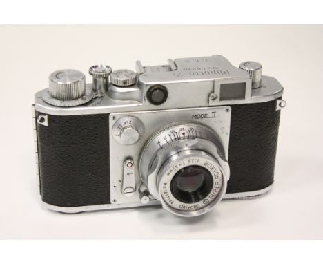 A Minolta 35 camera, Minolta-35 model 2 camera with f/2.8 45mm Super Rokkor lens