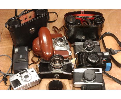 Various Cameras: a Petri 7s camera with others and 2 pairs of binoculars (a lot)