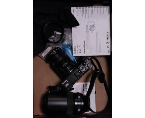 A Fujifilm X-E1 Digital Camera,  with Fujinon 18-55mm, and 55-200mm lenses, with various cards and accessories (a lot)