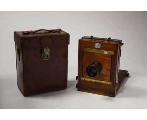 A F. Jones Mahogany Tail Board Camera, French, with A. Laverne Waterhouse-Stop brass lens, in maker's case