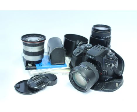 Minolta Dynax with lenses: a Dynax 7 camera with a f/3.5 19-35 Cosina, a f/3.5 24-105 Minolta and a f/4 70-300 Apo-Sigma (a l