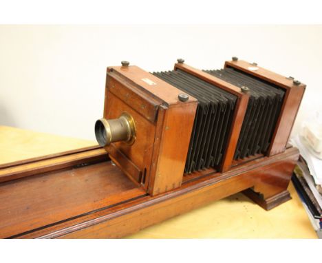 A W. Watson & Sons Plinth Mounted Scientific Half Plate Mahogany Camera, graduated 36 inch baseboard, double extension bellow