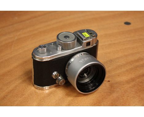 A Robot IIa Camera, with Schneider Xenar f/2.8 75mm lens, in maker's case