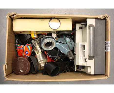 Various Accessories: quantity of various accessories including, bellows, film, projector, and more (a lot)