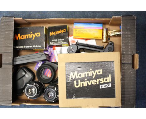 A Mamiya Universal Camera, Black camera body in makers box with f4.7 127mm and f5.6 150mm Mamiya lenses and other accessories