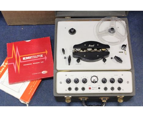 A Brenell Mk V M Reel To Reel Tape Recorder, with two tape reels containing BBC recordings, 'Flight of the Phoenix' on one re