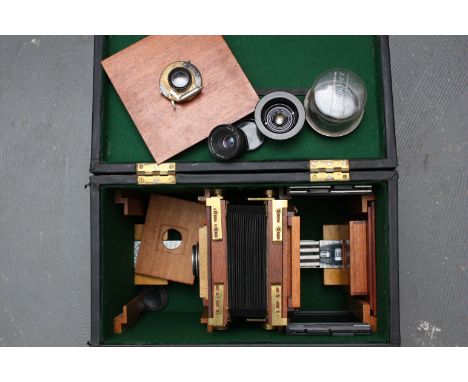 Hand made 5x4 camera, A hand made mahogany and brass monorail camera with a f/4.5 6 inch Cooke series II lens together with o