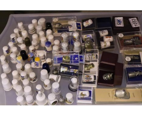 A collection of over sixty thimbles, mostly ceramic. Not available for in-house P&amp;P, contact Paul O'Hea at Mailboxes on 0