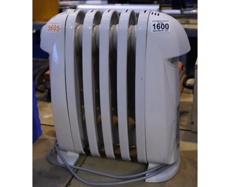 Delonghi Bambino oil filled radiator. Not available for in-house P&P, contact Paul O'Hea at Mailboxes on 01925 659133Conditio
