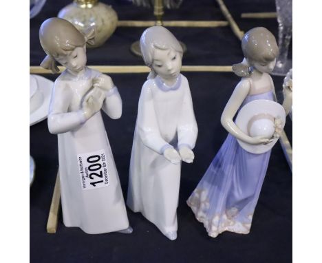 Three mixed Lladro and Nao figurines. Not available for in-house P&amp;P, contact Paul O'Hea at Mailboxes on 01925 659133 