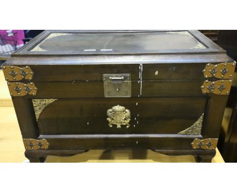 Oriental oak and brass lidded storage trunk. Not available for in-house P&amp;P, contact Paul O'Hea at Mailboxes on 01925 659