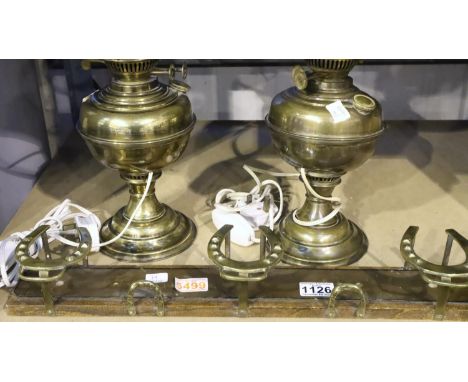 Brass horse shoe hanger and two electric converted brass oil lamps, one with shade. Not available for in-house P&P, contact P
