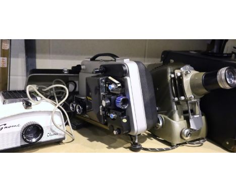 Raynox DU707A film projector and two slide projectors. Not available for in-house P&amp;P, contact Paul O'Hea at Mailboxes on