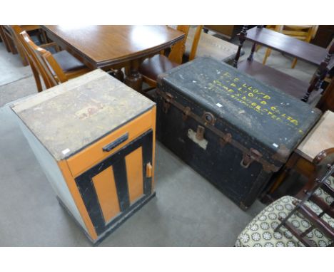 A painted pine cupboard and steamer trunk