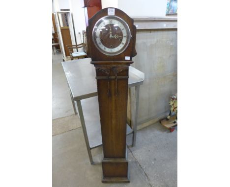 An oak dwarf longcase clock