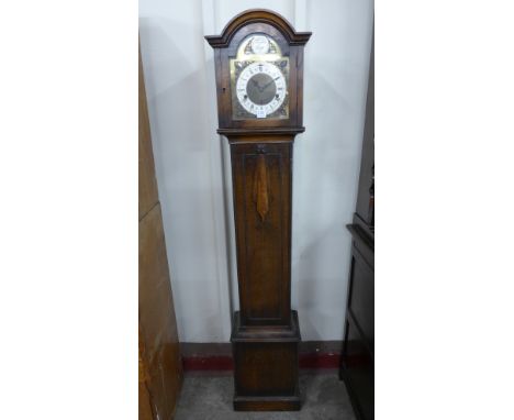 An oak dwarf longcase clock