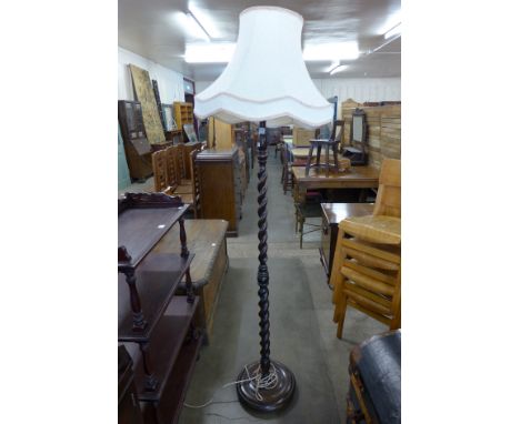 An oak barleytwist standard lamp