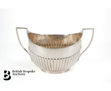 A twin handled silver sugar bowl, London, dated 1896, mm William Hutton &amp; Sons, approx 194.5 gms.&nbsp;