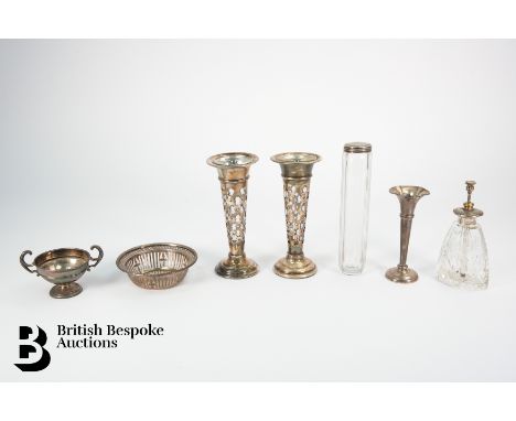 Pair of silver posy vases, stamped silver, with glass liners, approx 15 cms h, 194 gms together with a silver bud vase, Birmi