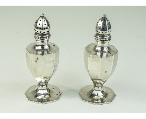 A Vintage Pair of Silver Pepperettes, Fluted Body's. Marked Sterling Silver. Each 3.75 Inches High. 75 grams. 