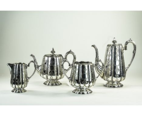 Victorian Nice Quality and Stylish 4 Piece Tea and Coffee Service. c.1875., with Ribbed Bodies and Elaborate Chased Decoratio