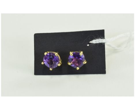 Amethyst Stud Earrings, rich purple amethysts, each of 1.25cts, round cut and placed in a five prong setting of 14ct gold ver