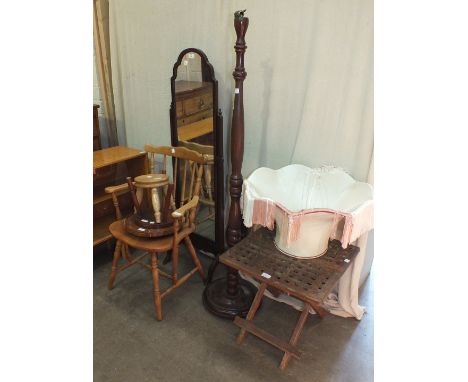A stained mahogany-framed cheval mirror, 142cm high, a stained mahogany standard lamp, a modern stripped wood stick-back armc