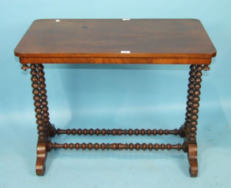 A 19th century mahogany rectangular centre table, the top on bobbin-turned end supports and stretchers, 89 x 49cm.