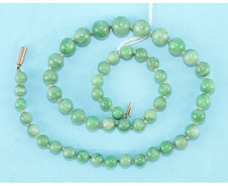 A necklace of graduated jade beads, largest 9mm, 43cm long, 33g, a bar brooch set seed pearls, with cannetile decoration and 