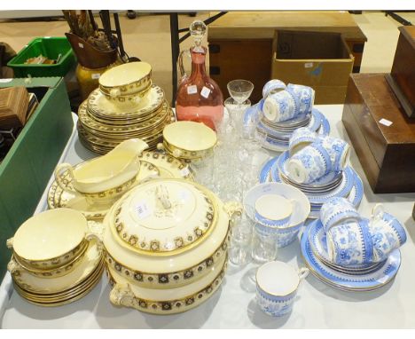 Thirty-six pieces of Royal Worcester blue and white willow pattern tea ware, thirty-seven pieces of Adderley Ware dinner ware