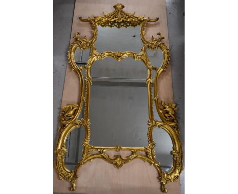 A full height contemporary gilt framed mirror in the Chinese Chippendale style. H.222 W.123 D.10cm