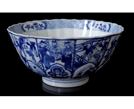 Porcelain bowl with contoured edge and rich blue decor of playing fools divided into cartouches, Chenghua marked, China Kangx