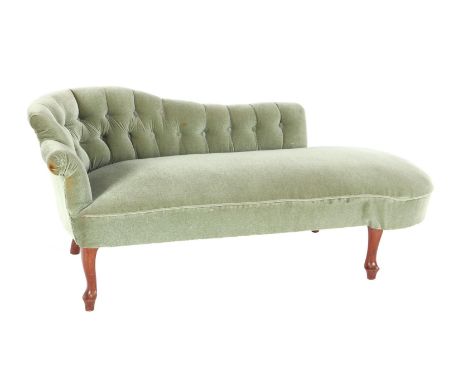 Green upholstered sofa standing on walnut legs, 67 cm high, 160 cm wide