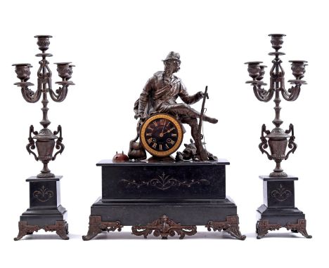 3-piece clock set with resting hunter on top with shot buck, clock is 46 cm high, the 5-light candlesticks are 50 cm high (cr