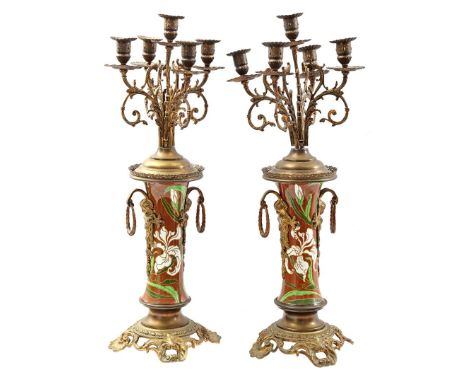 2 copper 5-light candlesticks with earthenware shaft with floral decoration, ca. 1910, 58.5 cm high