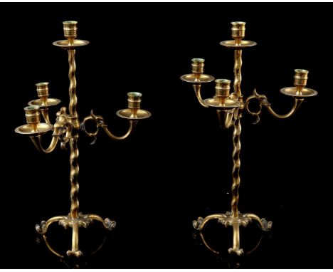 2 brass 4-light table candlesticks, 45 cm high, 28 cm diameter