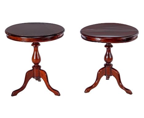 2 mahogany lamp tables, 64 cm high, 58 cm diameter and 66 cm high, 60 cm diameter