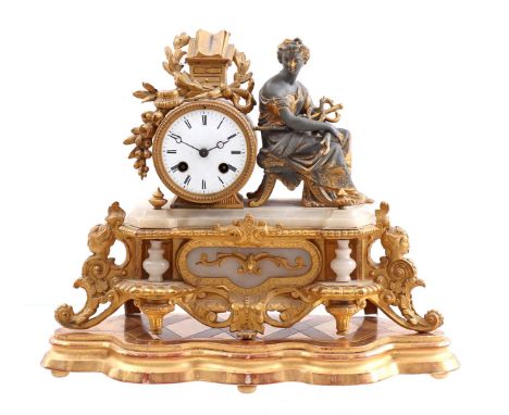 brass with alabaster classic mantel clock with zamak statue of a woman on next to clockwork, 28 cm high, 36 cm wide, on woode