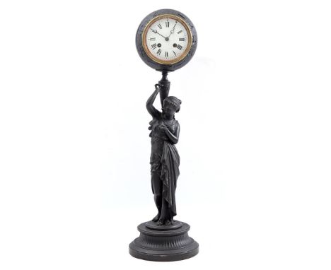 Table clock with a stand of an Egyptian woman carrying a sphere with signs of the zodiac, 61 cm high