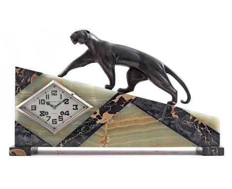Art Deco table clock in marble case with walking panther on top, A Lagerre d'Or, Rouen, 32 cm high, 52 cm wide (crank missing