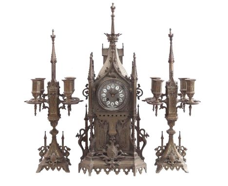 3-piece clock set in Neo-Gothic style consisting of a clock, 61 cm high with a 4-light candlestick on both sides