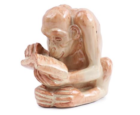 Glazed yellow baking small statue, Reading monkey, firm Petri Tegelen, Piet Pieters (1889-1950) 15 cm high