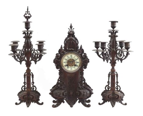3-piece clock set consisting of mantel clock 42 cm high with a 5-light candlestick on both sides with one candle snuffer