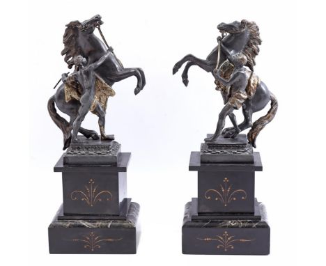 2 zamak statues of a man with a rearing horse on a marble console, 33 cm high